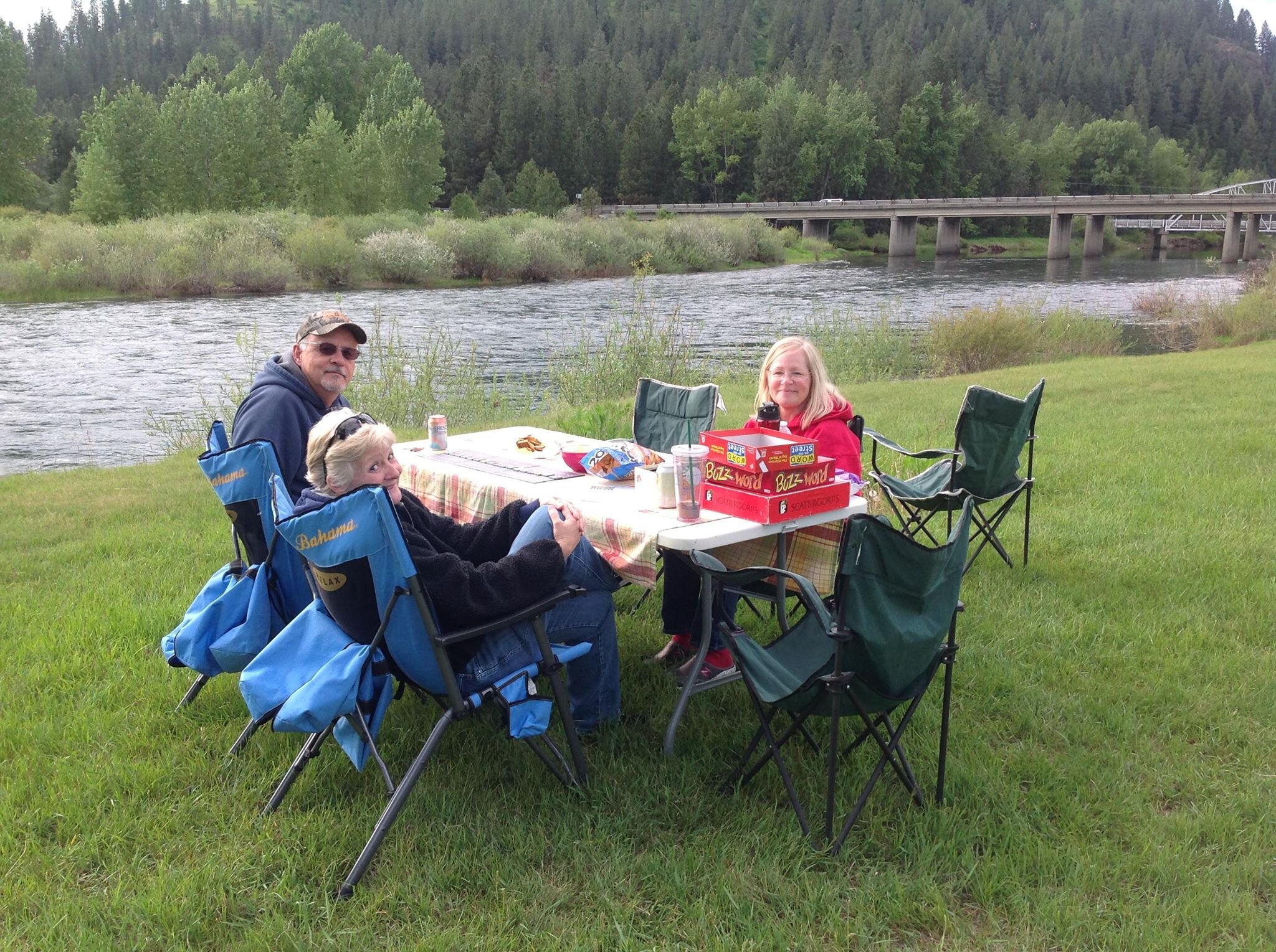 People picnicking at CDA River RV, Riverfront Campground